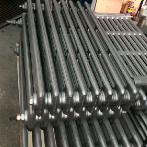 Imagen de los mismos radiadores de la foto anterior limpios y tratados